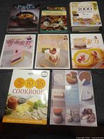 Front view of all eight cookbooks