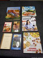 Front view of all 8 cookbooks laid out
