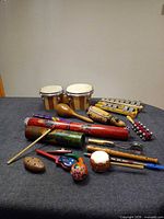 Group image of all instruments on grey cloth