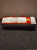 Carry bag with manufacturer label showing Outbound screen house