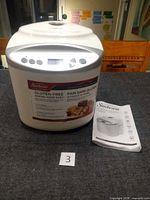 Breadmaker front view with manual