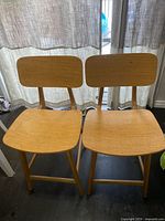 front view of both wooden chairs