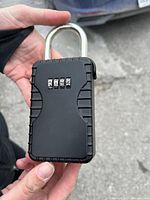 Front view showing 4-digit combination dials and overall condition