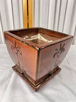 overall view of square glazed planter with saucer