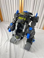 Front three-quarter view of the Batman Batbot standing upright