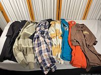 All eight garments laid out for overview