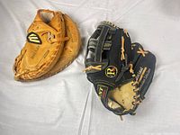 Top view of both gloves showing overall style and color