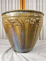 Full view of planter showing glaze colors and relief pattern