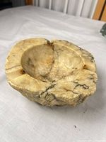Top view of cream veined stone ashtray polished bowl