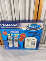 Front view of boxed Panasonic KX-TG2632PK system