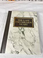 Front cover showing title and marble design