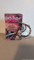 Front showing Harry Potter book cover and handle