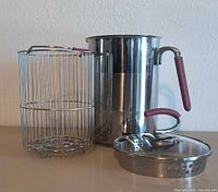 Pot, basket, lid displayed together