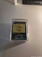 Plastic card holder containing the Silver Surfer trading card set