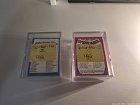 Two clear plastic cases with Series I and Series II labels