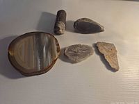 Group shot of all five stone specimens