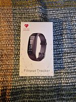Front of box showing generic fitness tracker packaging