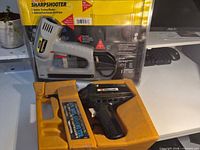 Stanley Sharpshooter tacker and Millers Falls soldering kit displayed together