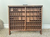 Front view showing compartment layout of letterpress drawer