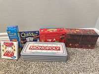 Front view of all six boxed games lined up