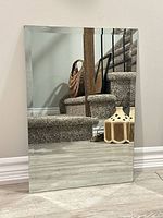 Front view of rectangular frameless mirror