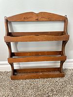 front view of wooden three-tier spice rack