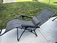 Chair fully reclined on patio