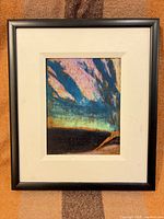 Front view of framed acrylic landscape painting