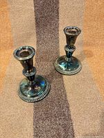 Both candlesticks side by side showing size, form and matching design
