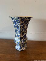 Full view of hexagonal blue paisley vase
