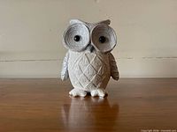 front view of owl showing eyes and diamond pattern