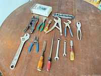 Overhead view showing all fourteen tools on table