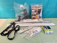 Group shot of all items including light strip, cords, RAM mount, Moving Cradle kit, headlamps, boxed items