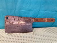 Full view of meat cleaver showing blade, handle, overall condition