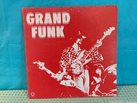 Front cover of Grand Funk Railroad LP showing title and artwork