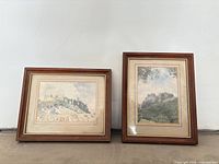 Front view of two framed Richard Tugwell castle prints