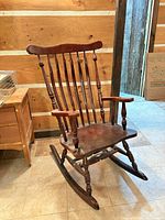 Full view of wooden spindle-back rocking chair
