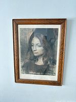 Front view of framed print showing subject and frame detail