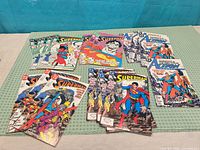 Overview of all comic stacks laid out on table