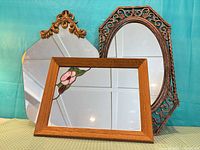 All three mirrors grouped for scale and comparison