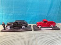 Overall view of both vehicle models on bases