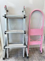 Front view of both ladders standing upright