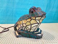 Front angle of stained glass frog lamp showing colour and glass pattern