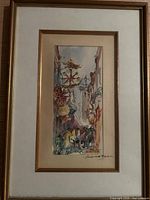 Full view of framed watercolor and ink painting