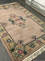 Full view of rug showing overall design, size and fringe