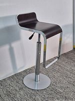 Full view of barstool showing seat, frame, base