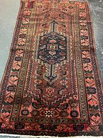 Full view of rug showing overall design and condition