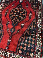 Close view upper section displaying medallion and motifs