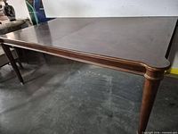 Full view of dining table top and legs