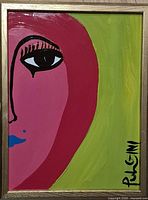 Framed abstract painting showing half face, full view